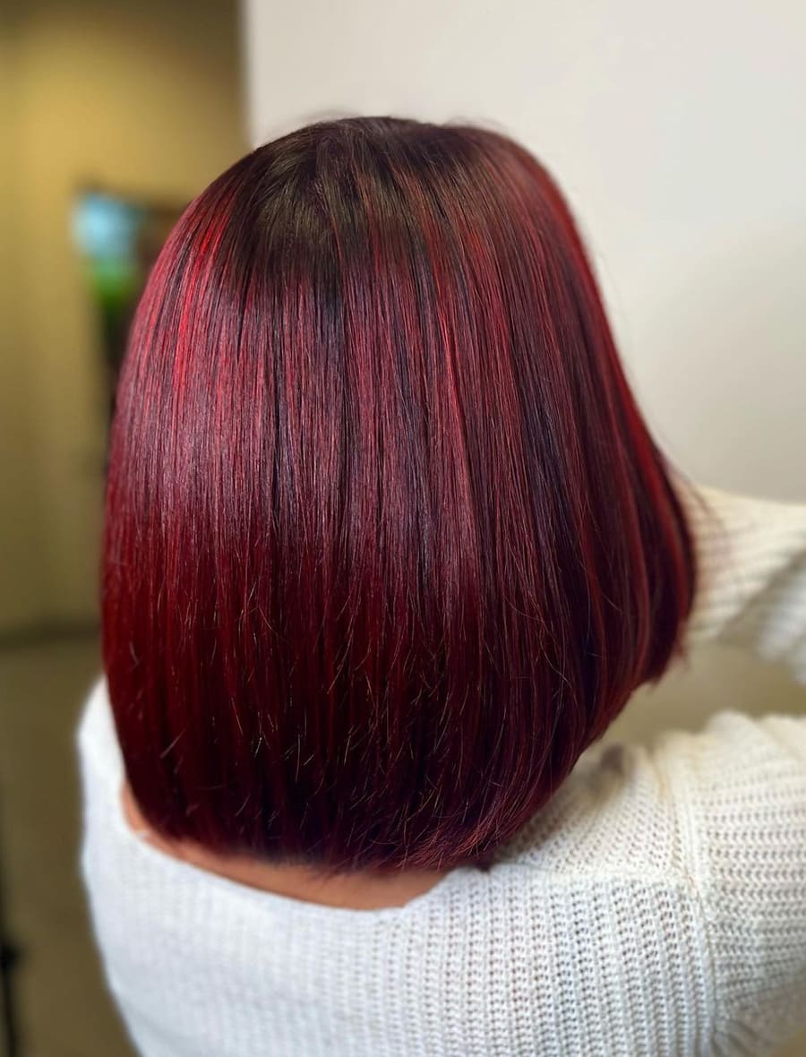 Rote Balayage mit kupfernen Spitzen